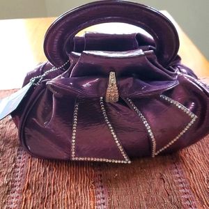 Purple purse with rhinestones